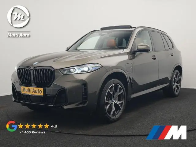 BMW X5 xDrive50e M Sport PHEV 490pk | SOH 96,3 Dealer O.H. | Panodak | Luchtvering | Laser LED | Ada...