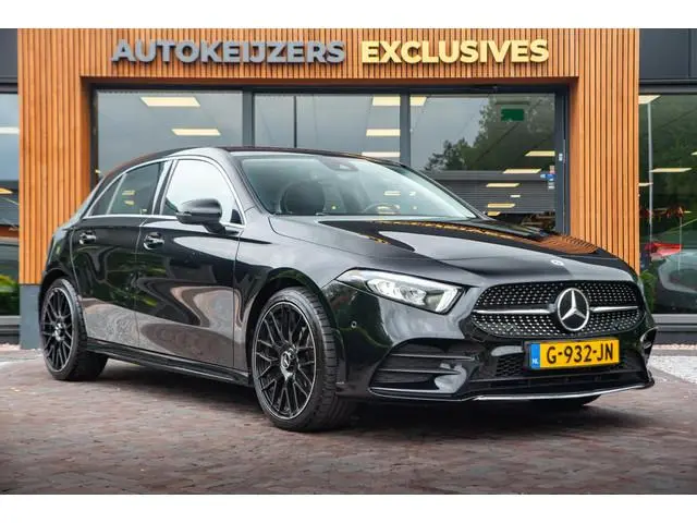 Mercedes-Benz A-Klasse 180 Business Solution AMG Ambient Cruise Navigatie Camera Sportstoelen Leer L...