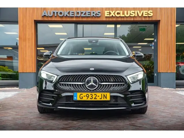 Mercedes-Benz A-Klasse 180 Business Solution AMG Ambient Cruise Navigatie Camera Sportstoelen Leer L...