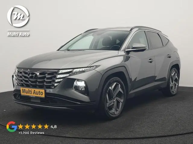 Hyundai Tucson 1.6 T-GDI Comfort 4WD PHEV 265pk Dealer O.H. | Adaptive Cruise | Trekhaak Afn. |  Cam...