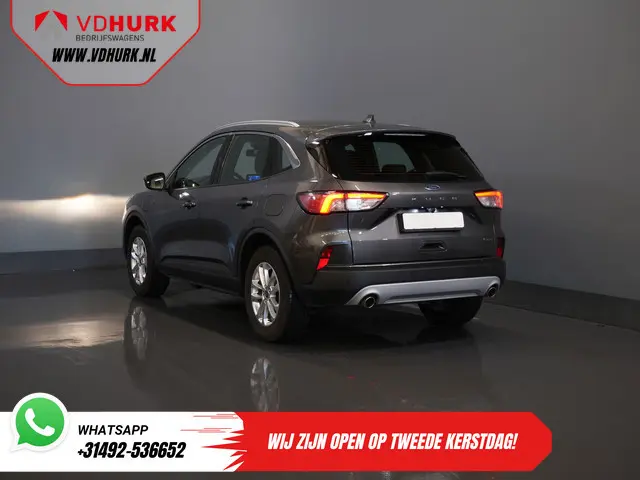 Ford Kuga 2.5 PHEV 225 pk Titanium Navi/ Carplay/ Stoelverw./ Stuurverw./ Camera/ PDC/ Climate