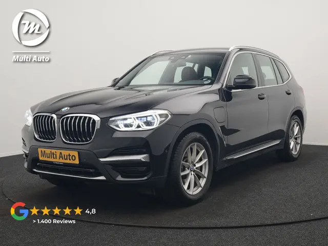 BMW X3 xDrive30e Luxury Line PHEV 293pk Dealer O.H. | Trekhaak Af Fabriek | Camera | Adaptief Onders...