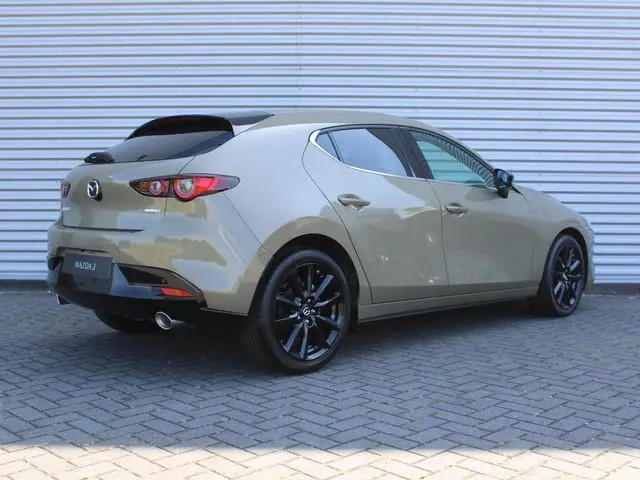 Mazda 3 2.0 e-SkyActiv-X M Hybrid 186 Homura | Stoelverwarming | Camera | Dodehoek detectie | HUD |...