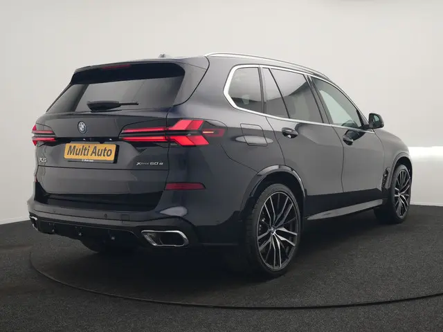BMW X5 xDrive50e M Sport PHEV 490pk Dealer O.H. | Panodak Sky Lounge | Luchtvering | Head Up | 360 C...