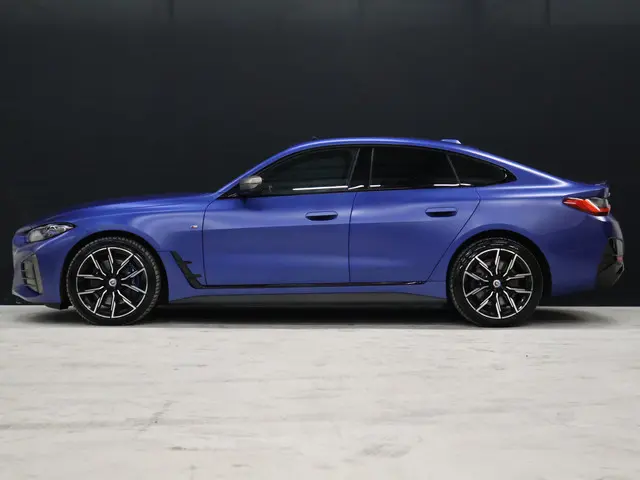 BMW i4 M50 High Executive 84 kWh SOH 94% [SCHUIFKANTELDAK, MEMORY SEATS, HARMAN/KARDON, APPLE CARPLA...