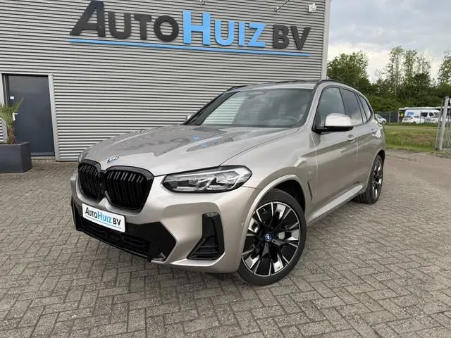 BMW iX3 High Executive 80 kWh SOH 100% M Sport Panoramadak Trekhaak Leder Harman-Kardon 20 inch 360...