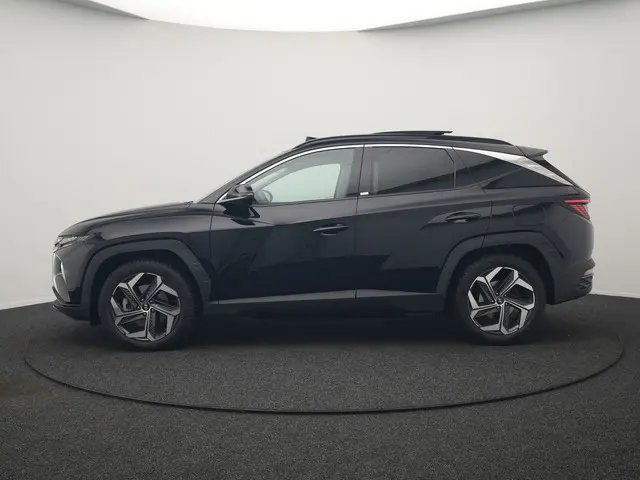 Hyundai Tucson 1.6 T-GDI Premium Sky 4WD Plug In Hybrid 265pk Dealer O.H. PHEV | Panodak | Adaptive...