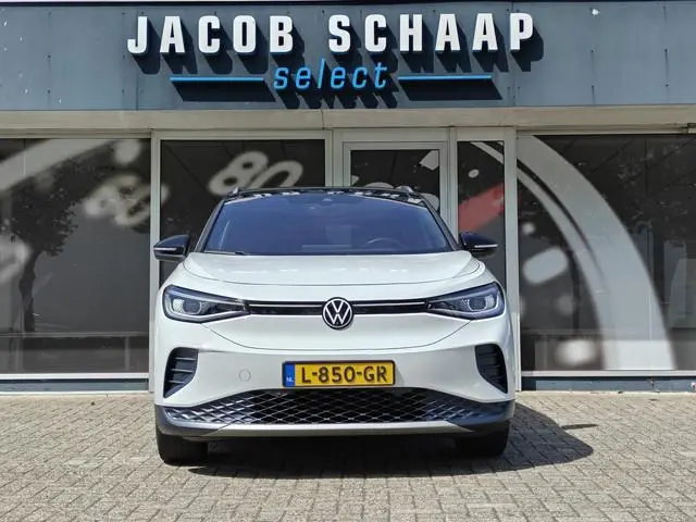 Volkswagen ID.4 First Max 77 kWh / Trekhaak / Warmtepomp / Panodak / 21" LM / Carplay / HU display