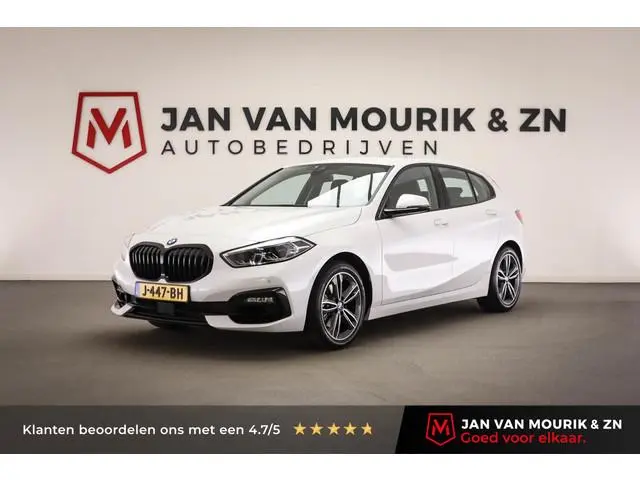 BMW 1-serie 118i Executive Edition | HALF LEDER | DAB | APPLE | DRAADLOZE LADER | CAMERA | 17"