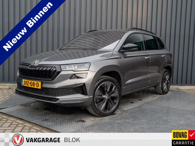 ŠKODA Karoq 1.5 TSI ACT Sportline Business | Leder | Camera | Adapt. Cruise control | Stoel & Stuur...