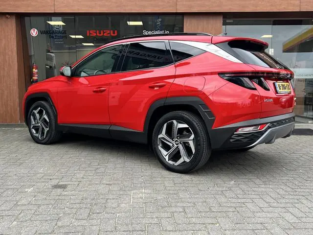 Hyundai Tucson 1.6 T-GDI HEV Comfort Plus Sky | Schuif/Kanteldak | Trekhaak | Add. Cruise control
