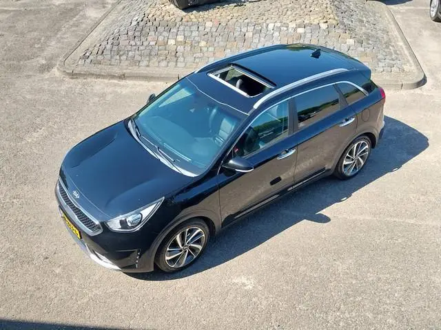 Kia Niro 1.6 GDi Hybrid First Edition 1e EIGENAAR OPEN DAK CAMERA HALF LEER LED NAVI CRUISE ECC