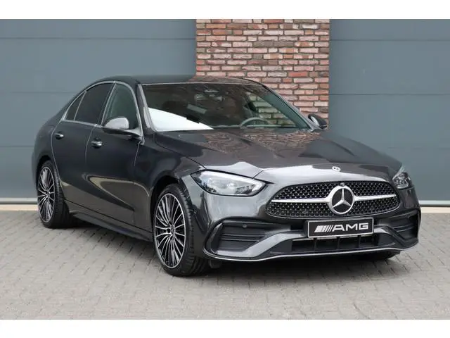 Mercedes-Benz C-klasse 300 e 4MATIC AMG Line | Massage | HUD | Memory | Leder | Keyless Go | Dodehoe...