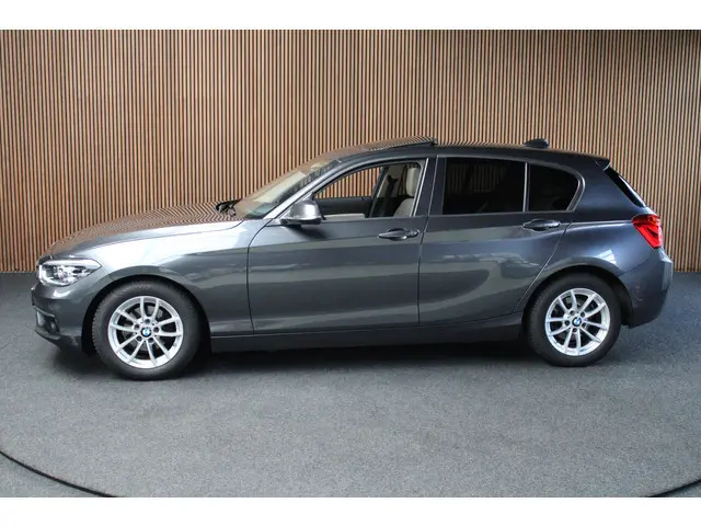 BMW 1-serie 118i Aut. Navi Leer schuif-/kanteldak Climate Cruise PDC Stoelverwarming LM velgen
